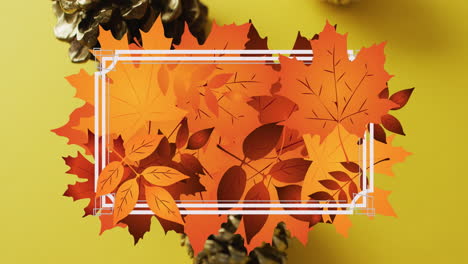 Animation-Von-Weißem-Rahmen-Und-Herbstblättern-über-Tannenzapfen-Auf-Gelbem-Hintergrund