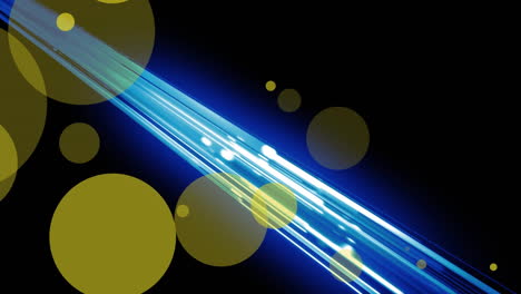 Animation-of-yellow-spots-over-glowing-blue-light-trails-against-black-background-with-copy-space