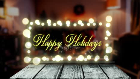 Animation-of-happy-holidays-text-on-fairy-lights-banner-over-wooden-plank-against-decorated-house