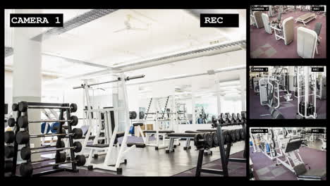 Four-security-camera-views-of-gym-interiors-with-free-weights-and-fitness-equipment,-slow-motion