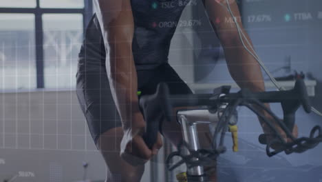 Animation-of-stock-market-data-processing-over-biracial-fit-man-training-on-exercise-bike-at-the-gym