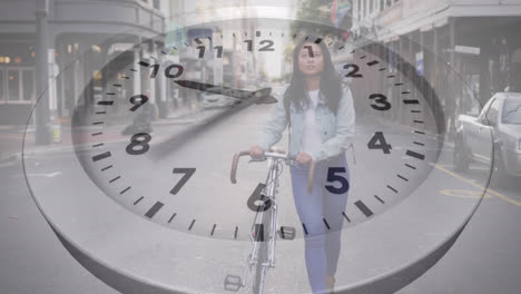 Animation-of-clock-over-biracial-woman-with-bicycle-walking