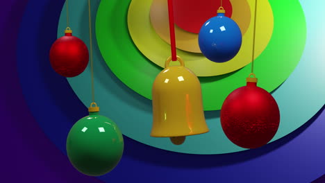 Swinging-colourful-christmas-baubles-over-rainbow-coloured-rings