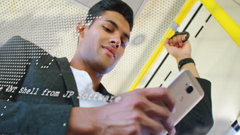 Young-biracial-man-uses-his-smartphone-on-public-transport