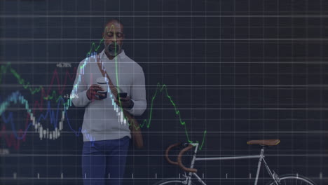 Animation-of-graphs,-african-american-man-with-coffee-cup-using-cellphone-standing-beside-bicycle