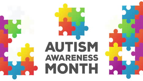 Animation-of-autism-awareness-month-text-with-colourful-puzzle-pieces-on-white-background