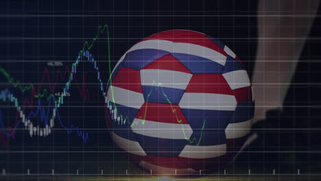 Animation-of-graphs-and-numbers-over-low-section-of-soccer-player-kicking-ball-with-netherlands-flag