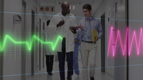 Animation-of-heart-rate-monitor-over-two-diverse-male-doctors-discussing-in-hospital-corridor