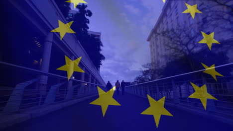 Animation-of-waving-eu-flag-against-time-lapse-of-people-walking-on-city-bridge