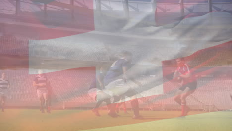 Animation-Der-Schweizer-Flagge-über-Einem-Team-Verschiedener-Männlicher-Rugbyspieler,-Die-Auf-Einem-Sportplatz-Rugby-Spielen
