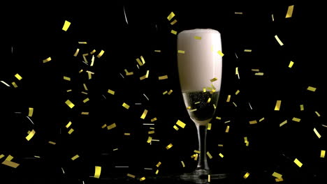 Animation-Von-Goldenem-Konfetti,-Das-Vor-Schwarzem-Hintergrund-über-Ein-Champagnerglas-Fällt