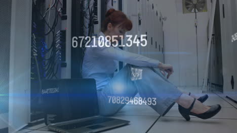 Animation-of-data-processing-over-caucasian-it-woman-with-laptop-by-computer-servers