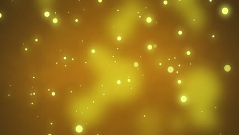 Glowing-yellow-flashing-christmas-light-particles-and-bokeh-lights-moving-across-dark-background