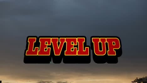 Animation-of-level-up-text-banner-against-sunset-sky