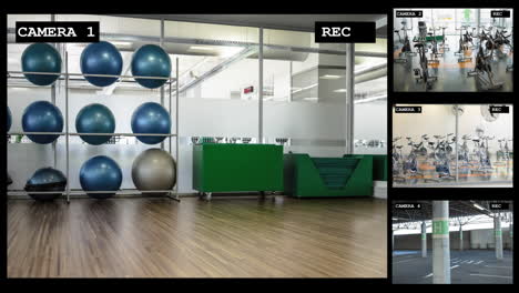 Four-security-camera-views-of-gym-with-exercise-rooms,-equipment-and-car-park,-slow-motion
