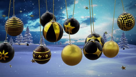 Black-and-gold-christmas-baubles-swinging-with-gold-stars-over-snow-and-winter-landscape