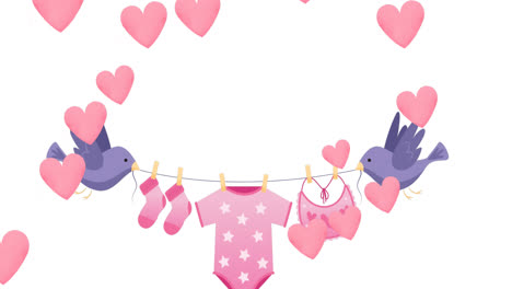 Animation-of-birds-holding-string-with-baby-clothes-over-white-background-with-hearts