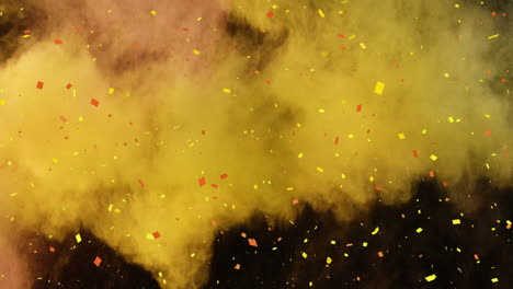 Animation-of-confetti-falling-over-colored-powder-explosion-against-black-background-with-copy-space