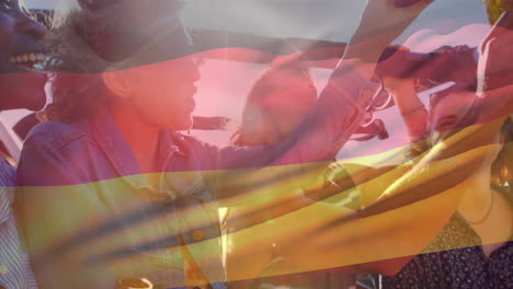 Composite-Video-Einer-Wehenden-Deutschlandflagge-über-Einer-Gruppe-Unterschiedlicher-Freunde,-Die-Im-Auto-Mit-Bier-Anstoßen