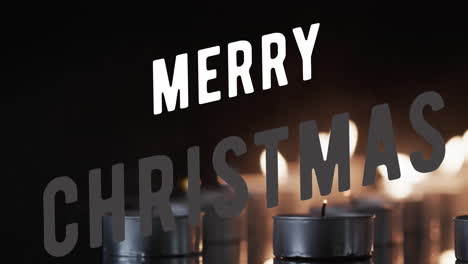 Animation-of-merry-christmas-text-over-lit-tea-candles-on-black-background