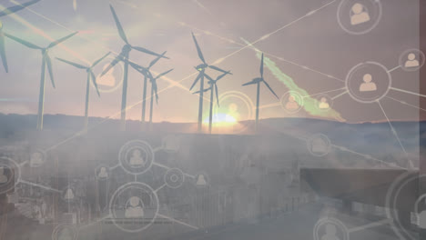 Animation-of-icons-and-wind-turbines-over-clouds