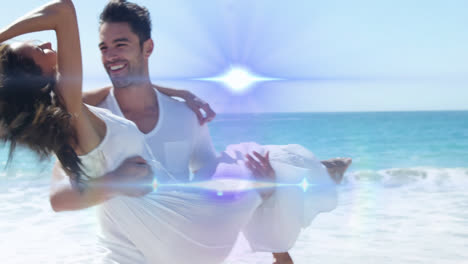 Animation-of-light-moving-over-happy-caucasian-newly-married-couple-on-beach