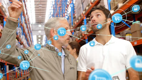 Animation-of-network-of-connections-over-caucasian-men-working-in-warehouse