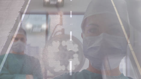 Animation-of-road-traffic-over-caucasian-female-surgeon-in-face-mask
