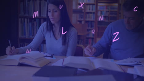 Animation-of-multiple-alphabets-floating-over-diverse-man-and-woman-studying-in-library-at-college