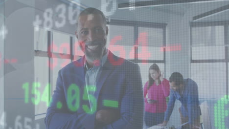 Animation-of-stock-market-data-processing-against-african-american-businessman-smiling-at-office