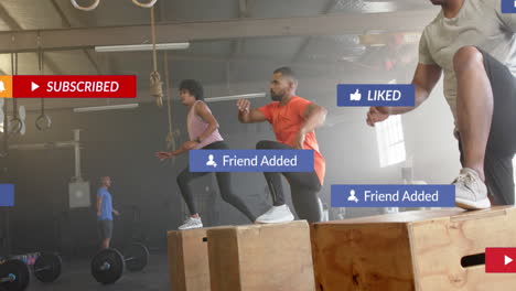 Animation-of-social-media-notifications-over-diverse-group-training-on-boxes-at-gym