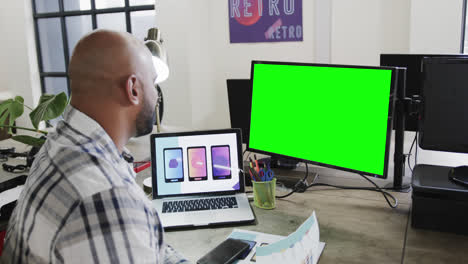 African-american-businessman-on-video-call-with-green-screen