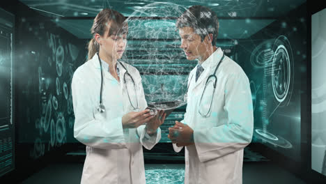Animation-of-data-processing-over-caucasian-male-and-female-doctors-talking