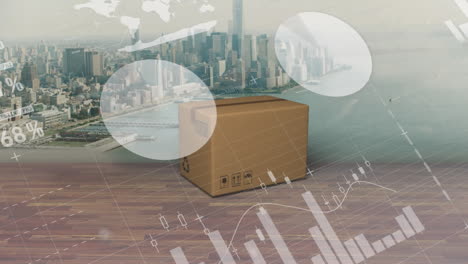 Animation-of-infographic-interface,-falling-cardboard-box-over-aerial-view-of-cityscape-against-sky