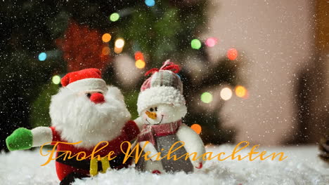 Animation-of-frohe-weihnachten-text-and-snow-falling-over-santa-and-snowwoman-miniatures