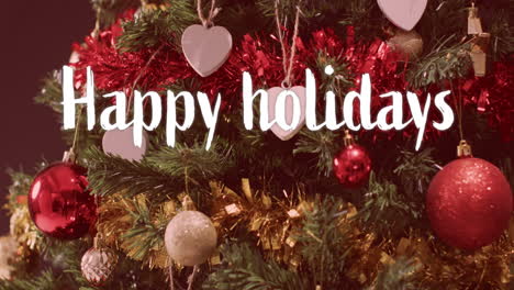 Felices-Fiestas-Texto-En-Blanco-Sobre-Decoraciones-En-El-árbol-De-Navidad