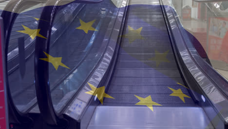 Animation-of-european-union-flag-over-escalator