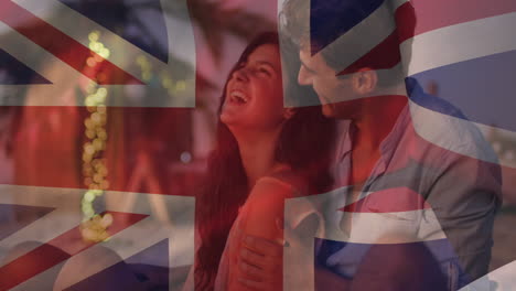 Animation-Der-Flagge-Des-Vereinigten-Königreichs,-Die-über-Einem-Glücklichen-Kaukasischen-Paar-Weht,-Das-Seine-Freizeit-Verbringt