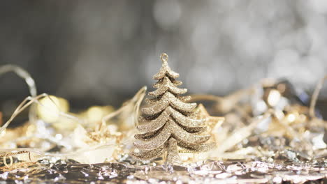Video-of-christmas-tree-decorations-and-copy-space-on-fairy-lights-background