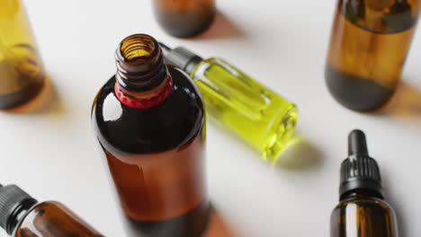 Close-up-of-dropper-serum-bottles-on-white-background