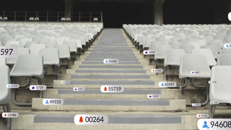 Animation-of-social-media-icons-foating-against-empty-stands-in-the-sports-stadium