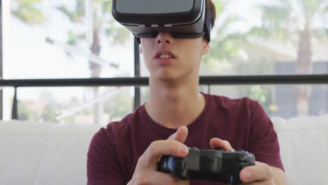 Asiatischer-Junge-Trägt-VR-Headset-Und-Spielt-Zu-Hause-Videospiele