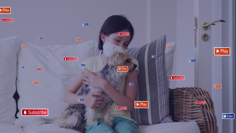 Animation-of-notification-icons-over-caucasian-girl-wearing-mask-holding-dog-on-sofa-at-home