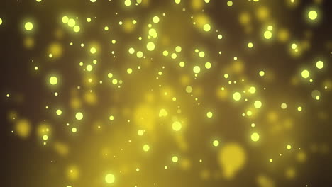 Glowing-yellow-christmas-light-particles-and-bokeh-lights-moving-on-dark-background