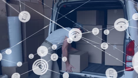 Animation-of-network-of-digital-icons-over-caucasian-delivery-man-loading-boxes-in-his-delivery-van