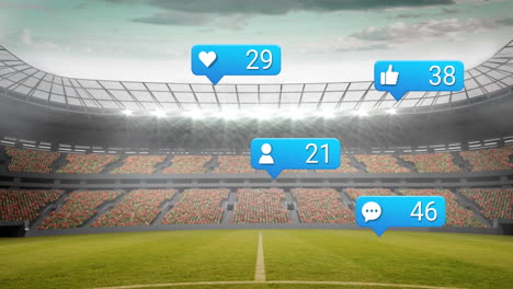 Animation-of-social-media-icons-floating-against-sports-stadium