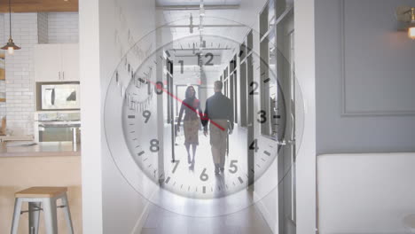 Animation-of-ticking-clock-against-view-of-diverse-people-walking-in-office-corridor