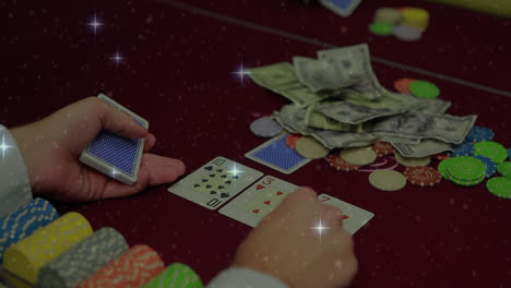 Animation-of-shining-stars-over-mid-section-of-male-croupier-distributing-cards-at-casino-table