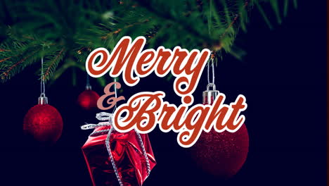 Animation-of-merry-bright-text-over-hanging-baubles-and-gift-box-on-christmas-tree