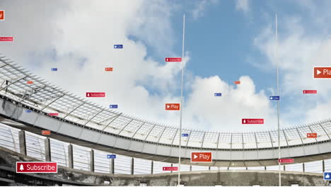 Animation-of-social-media-icons-floating-against-sports-stadium-and-blue-sky